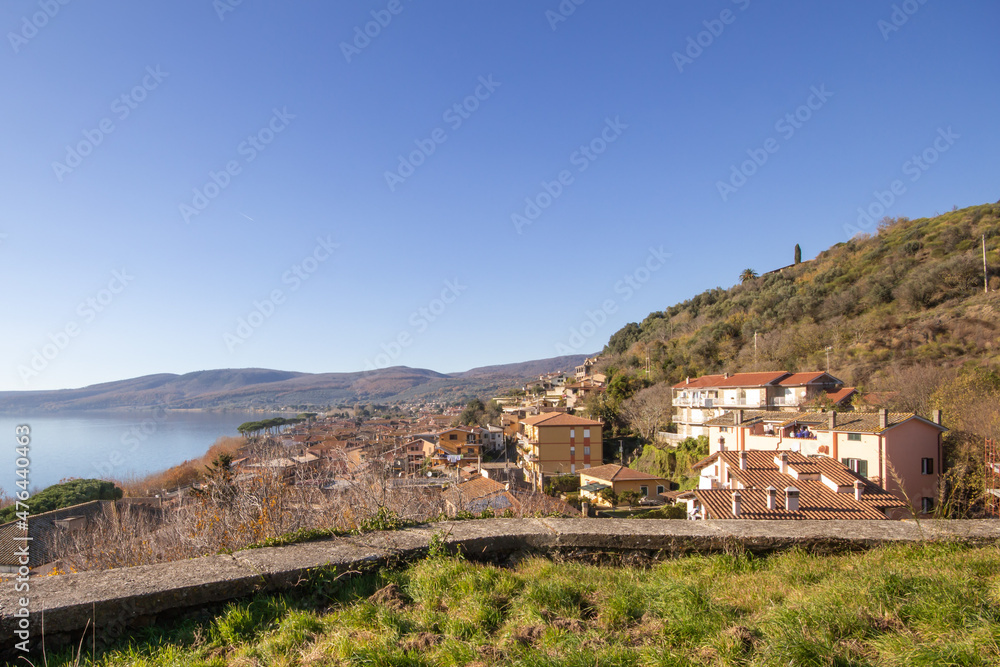 Bracciano lake with a wide view surrounding the observer town Trevignano Romano,Italy.Photography on the Trail to La Rocca view point