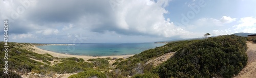 Panoramic view on Lara Beach, Cyprus from above. Hidden gem, not spoiled by tourists. Solitude, calm feelings, waves gently spreading on the beach. turquoise color of the water. Turtle hatching beach © Chris