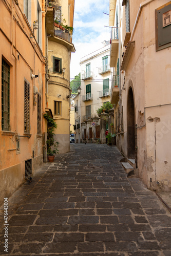 Narrow colorful streets with house altars  laundry in Salerno  Italy