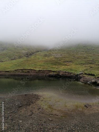 The wild nature and foggy mountains of the Faroe Islands