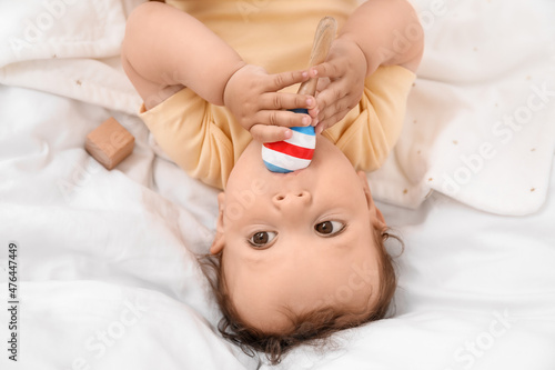Cute little baby with toy l...