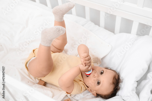 Cute little baby with toy l...