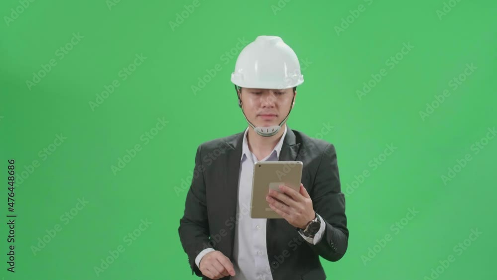 Asian Chief Engineer In The Hard Hat Use Tablet While Walking On Green Screen Chroma Key
Asian Chief Engineer In The Hard Hat Use Tablet While Walking On Green Screen Chroma Key