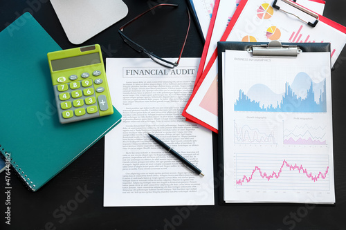Business documents with pen...