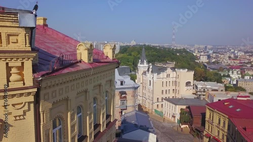 an aerial view of andriivskyi descent in the downtown of kyiv, ukraine. ancient buildings, castle of richard lionheart, old streets photo