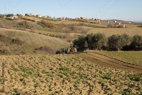 farmer preparing the land for sowing wheat