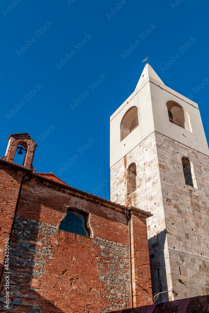 Fototapeta premium Oratory of the Holy Cross and church bell tower, historic center of Cascina, Pisa, Italy
