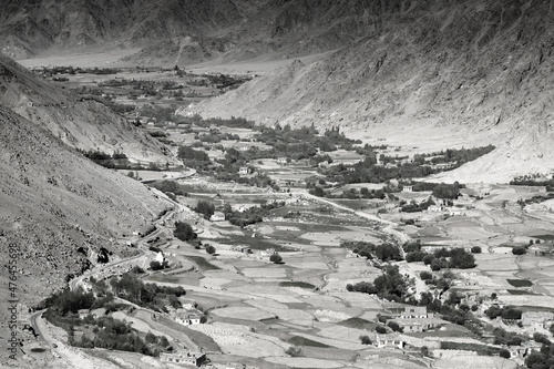 Aerial view of ladakh landscape, from top of Changla pass, green valley field of agriculture , leh, ladakh, India. Black and white image. photo