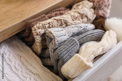 Knitted hats in chest of drawers