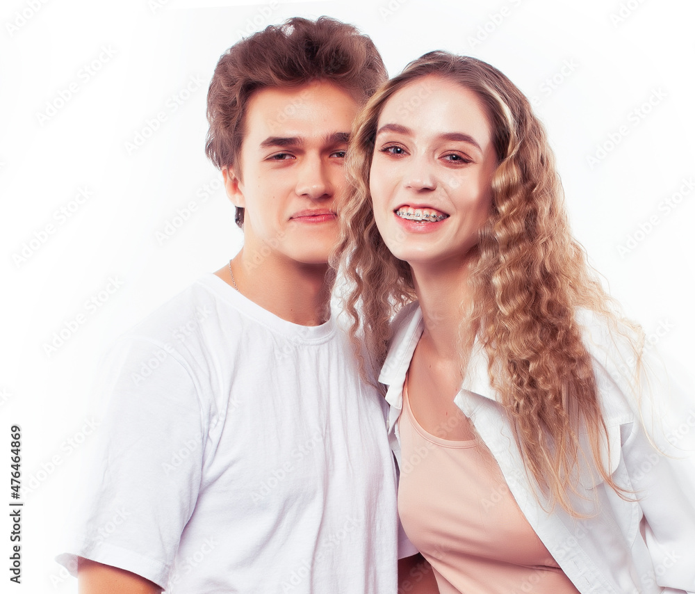 young attractive couple together having fun happy smiling isolated on white background, emotional posing, lifestyle people concept young attractive couple together having fun happy smiling isolated on white background, emotional posing, lifestyle people concept