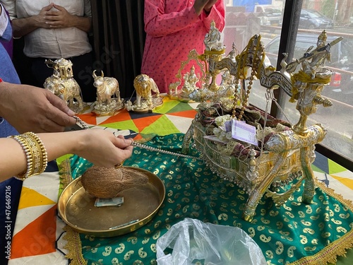 Cradling Lord Mahavir with hands on the occasion of Mahavir Jayanti photo