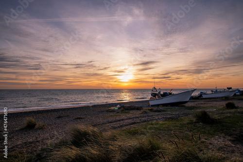 Dawn breaking over the North Sea in Suffolk, UK photo