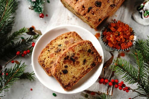 Homemade Xmas fruit cake or Indian tutti frutti bread on Christmas holiday background, selective focus