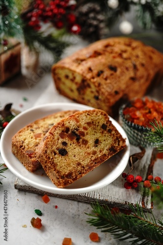 Homemade Xmas fruit cake or Indian tutti frutti bread on Christmas holiday background, selective focus photo