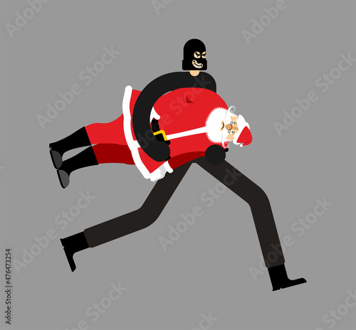 Thief stolen Santa Claus. Burglar Stole grandfather. Criminal carries. New Year is canceled. There will be no holiday