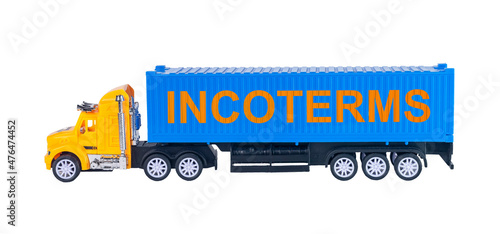 Incoterms word. International commercial terms, text on truck with container. photo