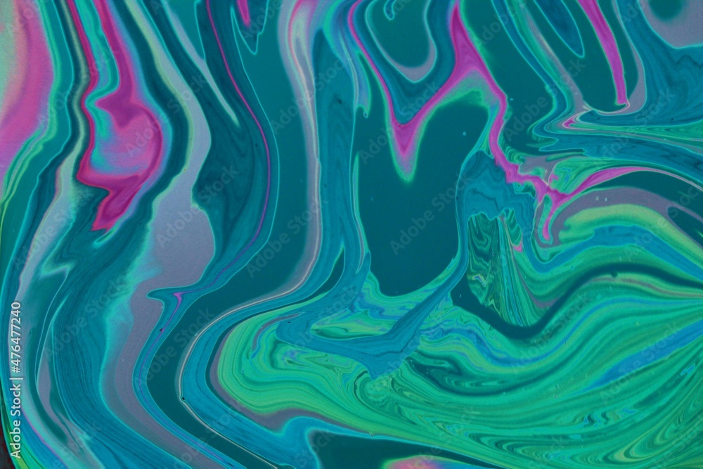 Abstract green marble background. Acrylic texture with marble pattern. Mixing colors creates an interesting structure. It is well suited for laptop background and wallpaper, fabric Abstract green marble background. Acrylic texture with marble pattern. Mixing colors creates an interesting structure. It is well suited for laptop background and wallpaper, fabric