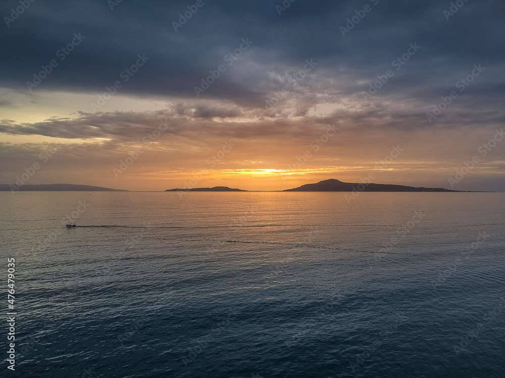 Aerial panoramic view of Elafonisos island over the Laconian gulf at sunset in Peloponnese, Greece, Europe.