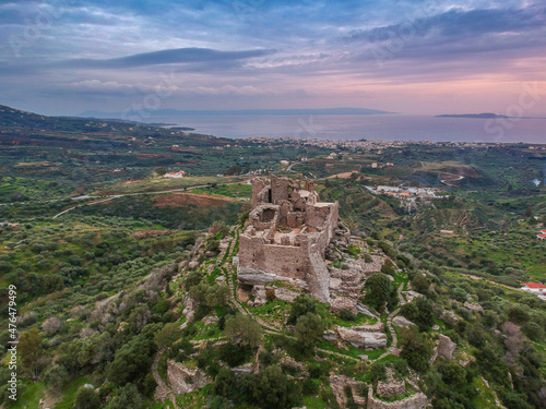 Aerial view of the Castle of Vatika or Castle of Agia Paraskevi at sunset. The castle is located in Mesohori village and has a wonderful view of Neapolis town and Elafonissos island, Laconia, Greece.