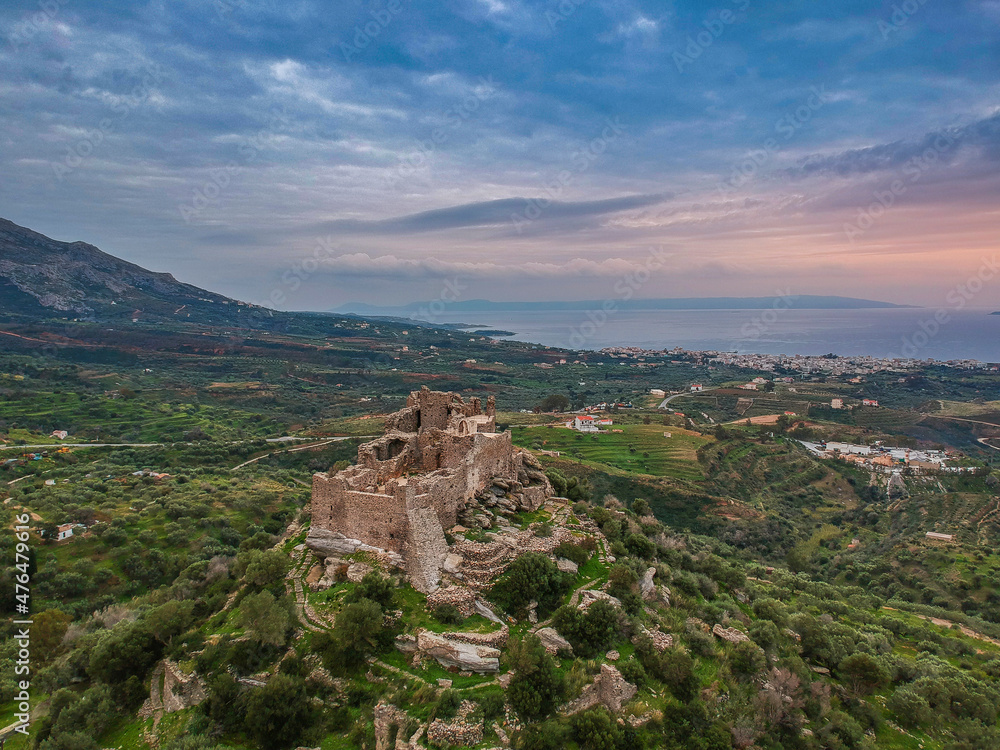 Aerial view of the Castle of Vatika or Castle of Agia Paraskevi at sunset. The castle is located in Mesohori village and has a wonderful view of Neapolis town and Elafonissos island, Laconia, Greece.