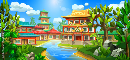 A small Asian village stands on the banks of the river. Ancient national houses and pagodas with colorful roofs.