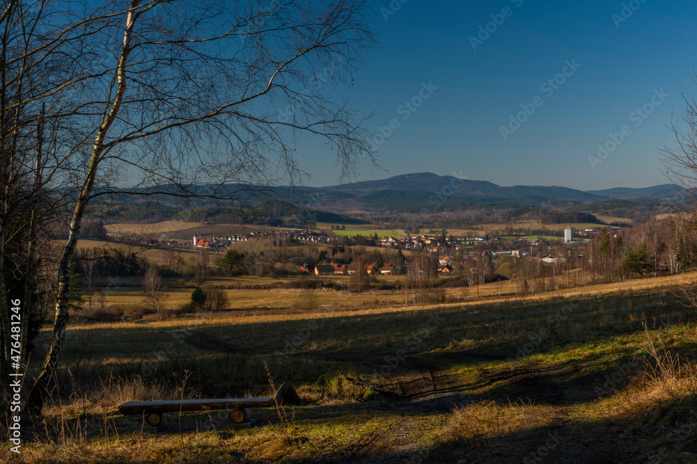 Kajov village with big church with high tower in winter blue sky day