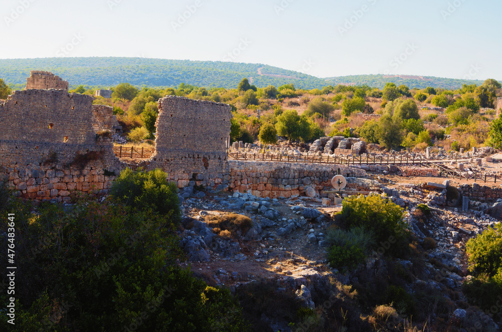 Kizkalesi,Turkey-October 11,2021:Panoramic landscape view ruins of antique city. Kanlidivane ancient city in Mersin Province, Turkey. Open air museum.