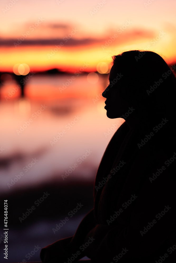 woman silhouette tranquillity sunset background, travel in Tajo river. Toledo, Castilla la mancha