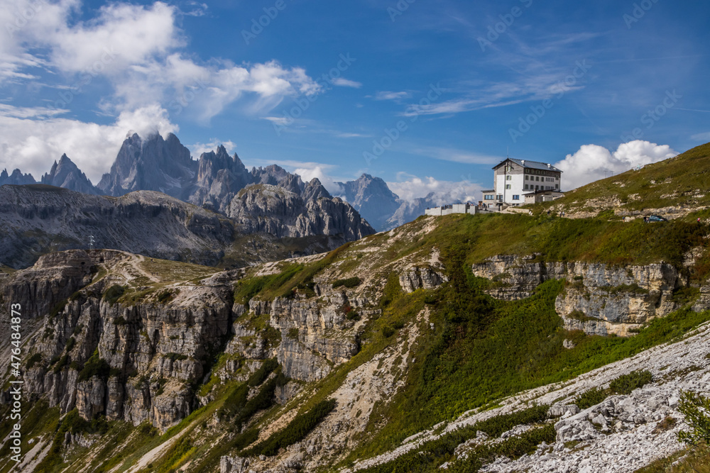 clouds over mountain trail Tre Cime di Lavaredo in Dolomites in Italy