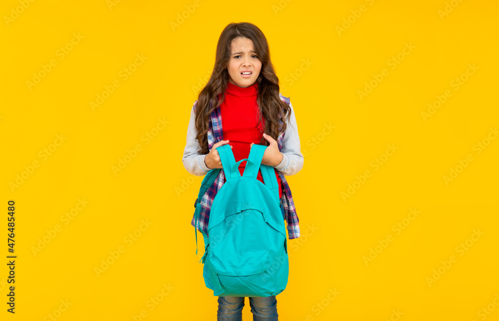 back to school. knowledge day. concept of education. kid in casual clothes on yellow background. back to school. knowledge day. concept of education. kid in casual clothes on yellow background.
