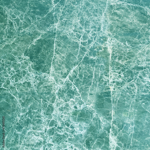 Raster marble texture similar to water, waves and ocean. © Dana