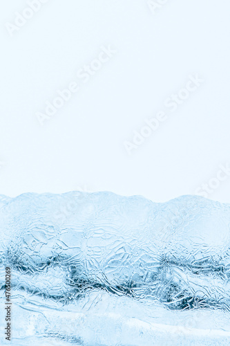 Abstract ice texture. Frozen crystals and icicles on white background. Strong frost in winter. © Galina Atroshchenko