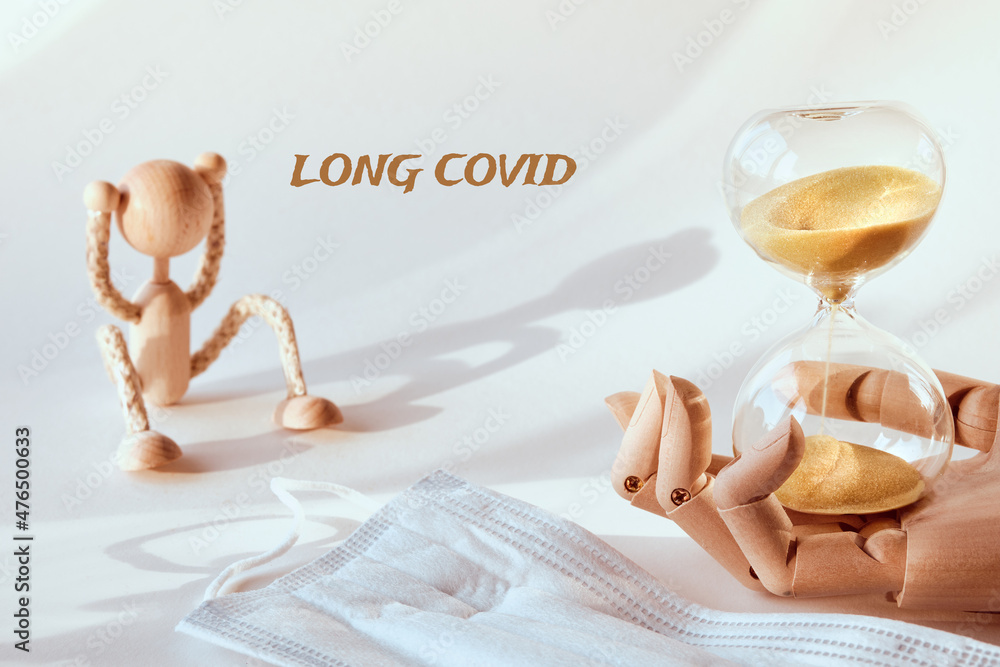 Long covid, postcovid syndrom, long haulers. Tired wood toy human