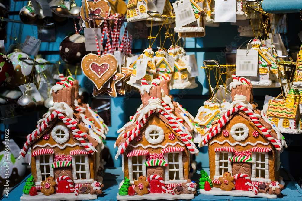 Little houses. Christmas decorations on sale in a garden centre, near Lacock, England