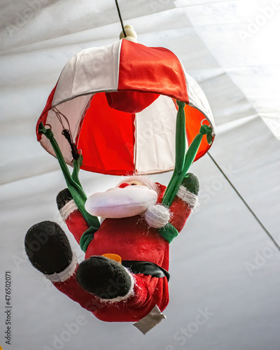 Father Christmas-Santa Claus. Christmas decorations on sale in a garden centre, near Lacock, England © paolav1