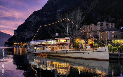 battello sul lago al tramonto photo