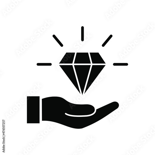 hand holding a diamond