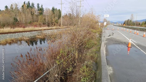 video of water flooding the highway. natural disasters disrupt transportation by land. Flood aftermath on Highway 11 in Abbotsford, British Columbia, Canada photo