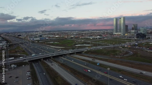 urban footage and cityscapes with twilight skies. aerial drone of residential and commercial neighborhood at Highway 7 and Highway 400 in Vaughan, Canada photo