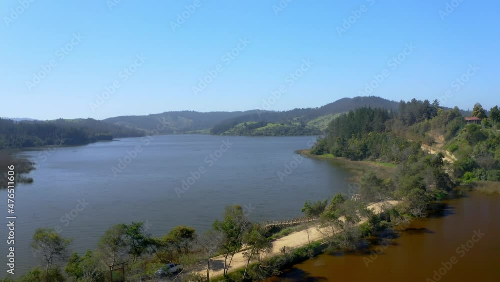 Laguna torca, curico region of maule, travel through chile drone shot wide shot traveling out Laguna torca, curico region of maule, travel through chile drone shot wide shot traveling out