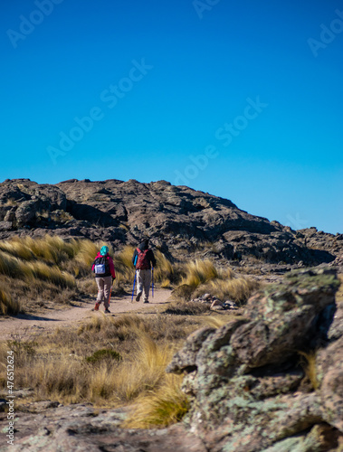 people walking from esplada do trekking on a mountain photo