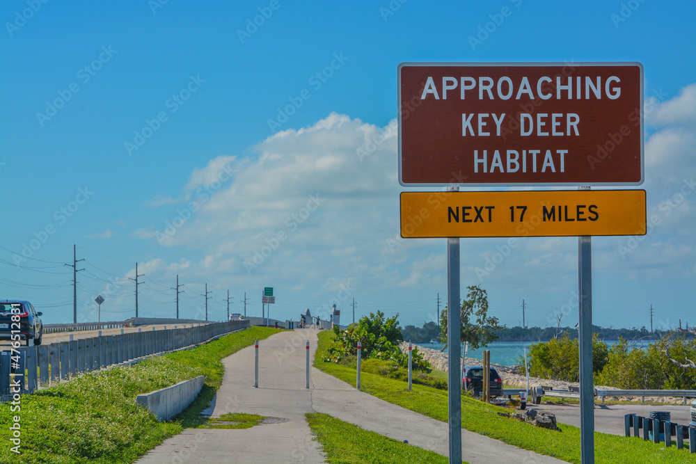 Approaching Key Deer Habitat Sign to protect the endangered deer in the