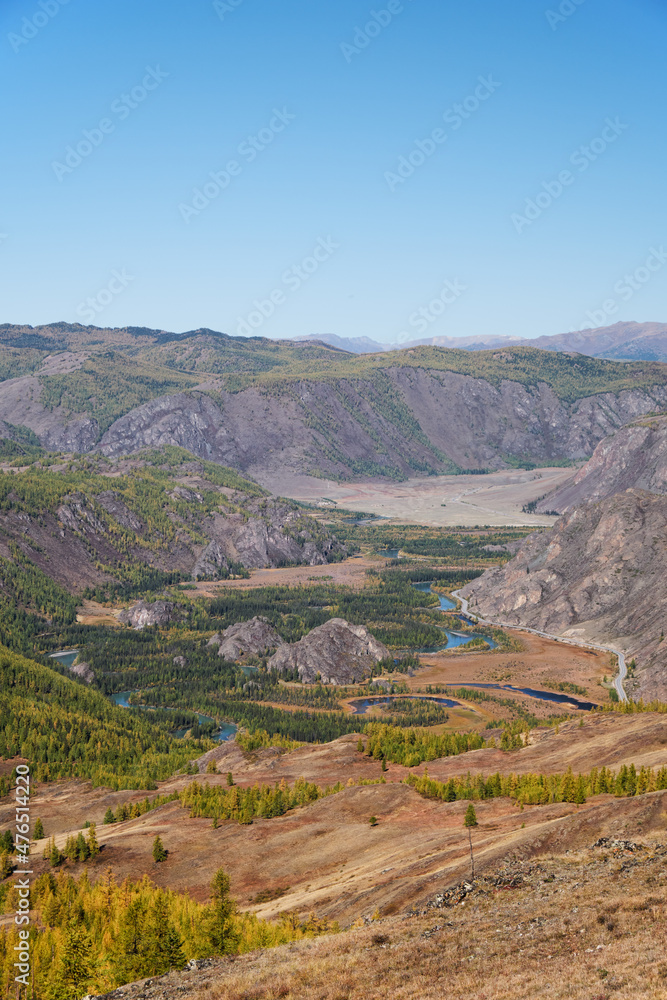 Autumn highland landscape. Altai river Chuya surrounded by mountains. Altai, Russia.