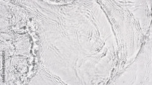 Water waves crossing and splashing on white background | skincare background, cleanser commercial