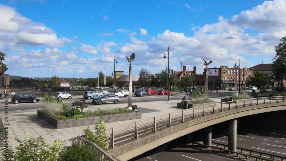 cars on multilane highway driving under road bridge. Traffic in city cars on multilane highway driving under road bridge. Traffic in city