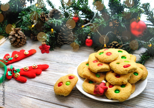 Christmas baking. Ginger dough for gingerbread, gingerbread men, stars, Christmas trees, rolling pin, flour. On the home kitchen white marble table. Copy space