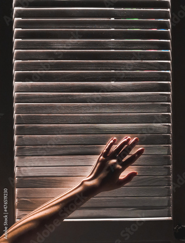 hands holding a window