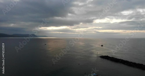 Aerial Looking Out To English Channel From The Cobb Marina At Lyme Regis. Dolly Forward photo