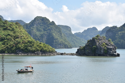 Ha Long Bay Medium Wide View with Small Fishing Boat in Foreground