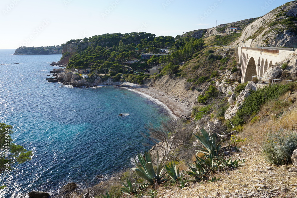 view of the coast and old stone bridge in the calanques near marseille france
